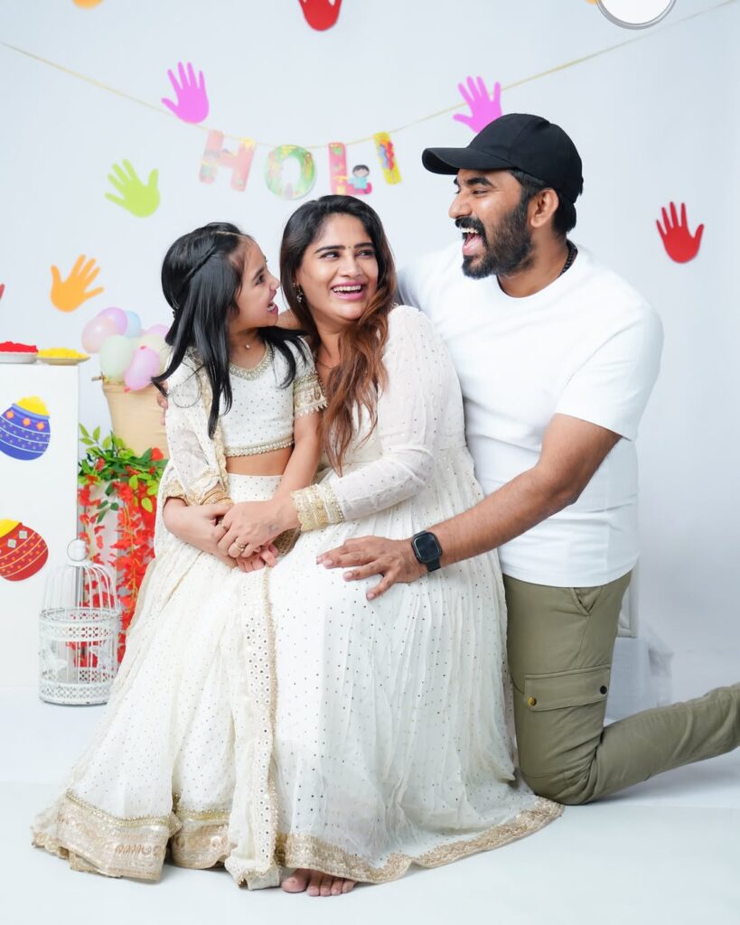Santosh Pavan with wife and daugther